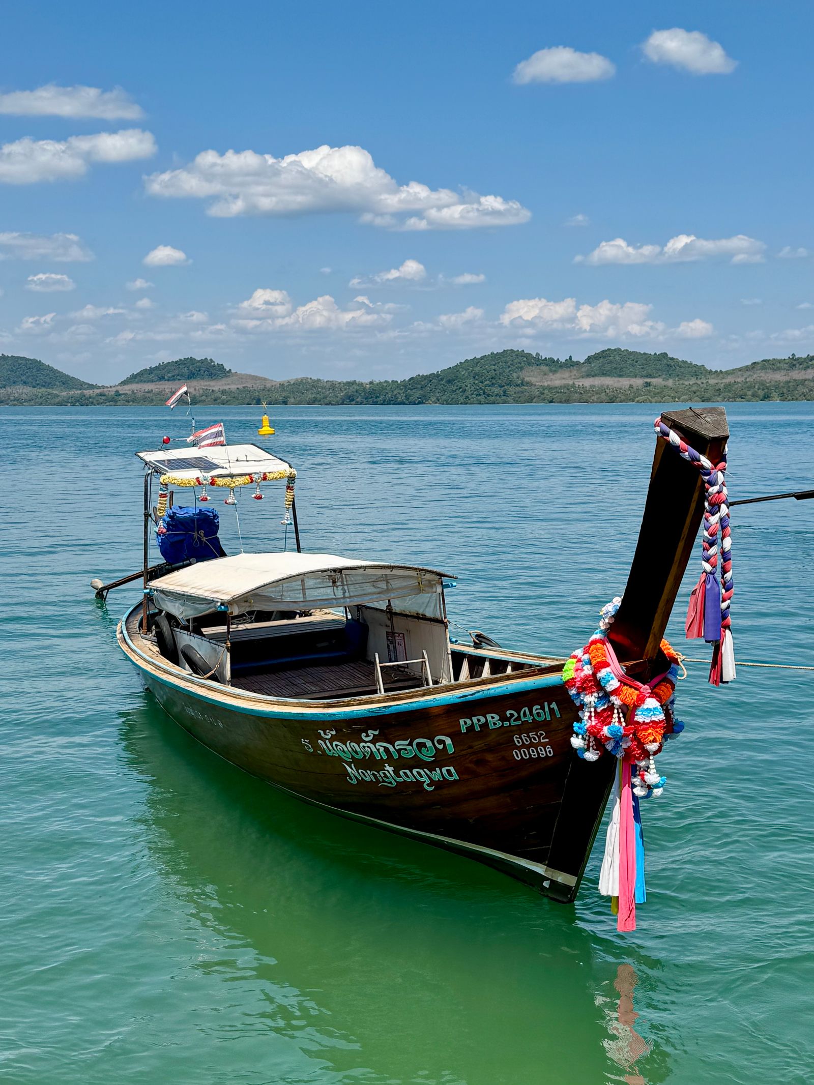 Longtail boat on a calm sea