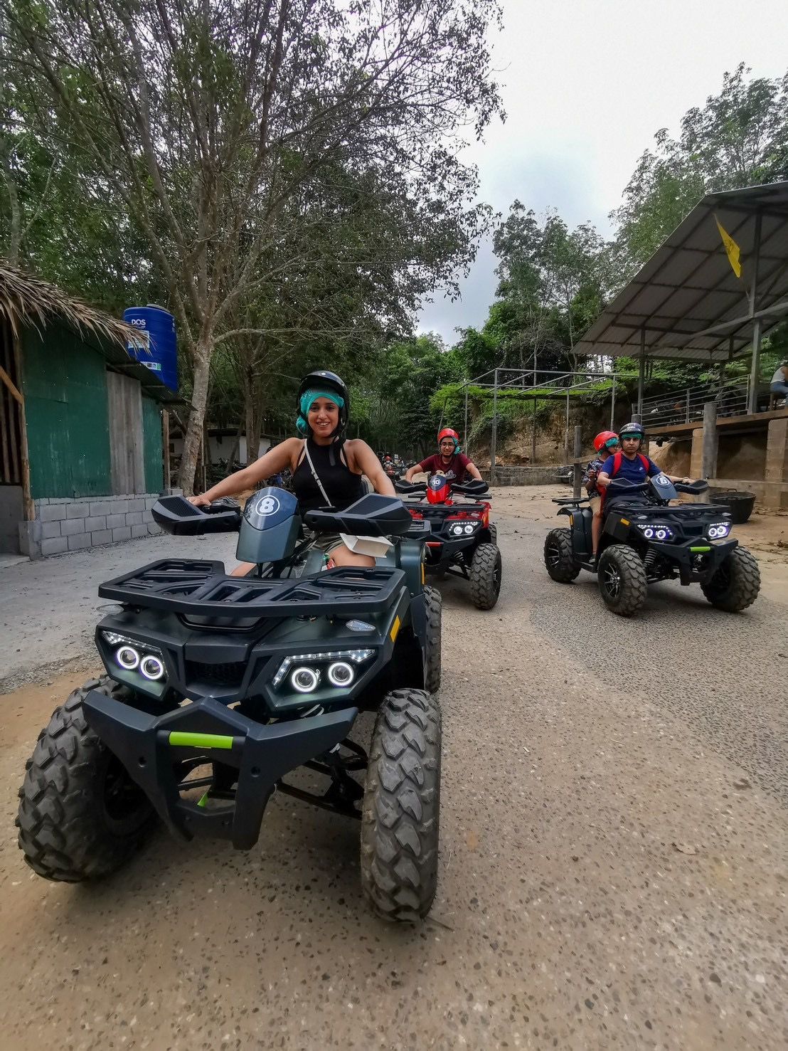 Group of riders on ATVs at the Phuket jungle base
